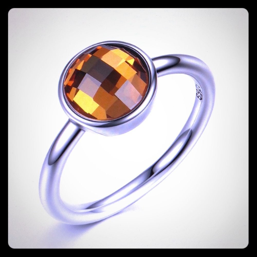 Sterling silver multi-faceted CZ Ring.